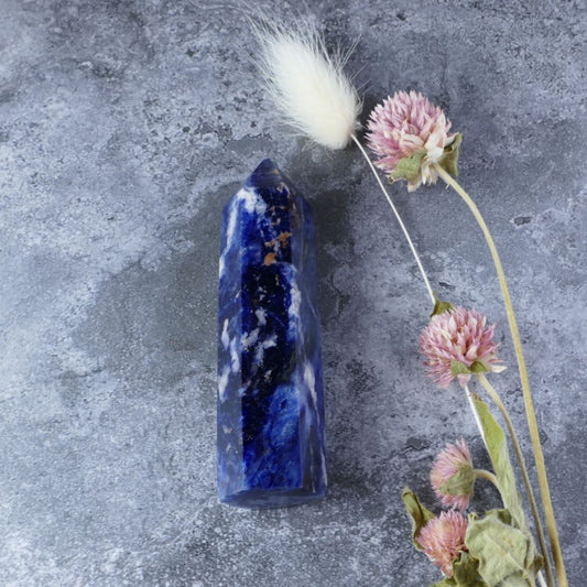 Dumi's Crystals Sodalite Tower: A deep blue crystal point promoting peace, communication, and logic.