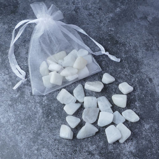 Dumi's Crystals | White Moonstone Chips Pouch (20g) | A luxurious organza pouch overflowing with White Moonstone chips, each showcasing their ethereal glow. White Moonstone is known for its transformative power, promoting intuition, inner peace, and spiritual growth.