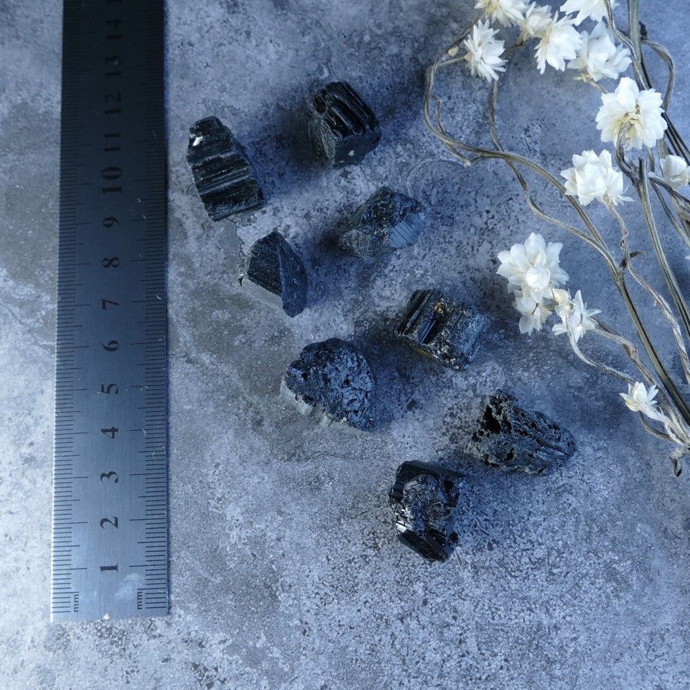 Carry Protection with You! Dumi's Crystals Black Tourmaline (5-10g, 10-20g; 1.5-3cm). Raw black tourmaline stones promote grounding & protection. Perfect for on-the-go.
