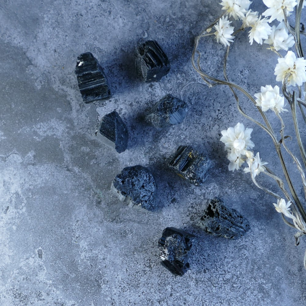 Dumi's Crystals Black Tourmaline (5-10g, 10-20g; 1.5-3cm). Embrace inner peace! Raw black tourmaline gemstones promote grounding and shield negative energy.