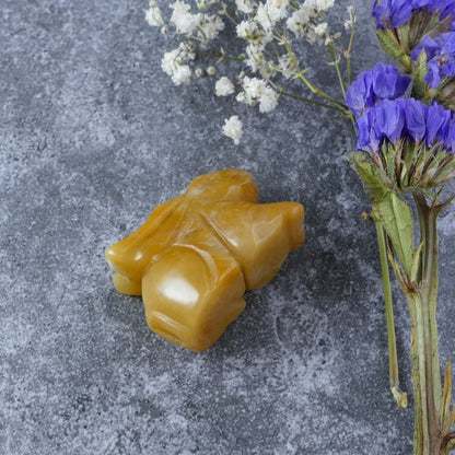 Dumi's Crystals | Yellow Aventurine Bunny Carving (Cheerful Energy):  A Yellow Aventurine Crystal Bunny Carving, a source of cheerful energy. This symbol of optimism & joy uplifts your spirits & brings sunshine into your space. Embrace happiness with Dumi's Crystals (ethically sourced).