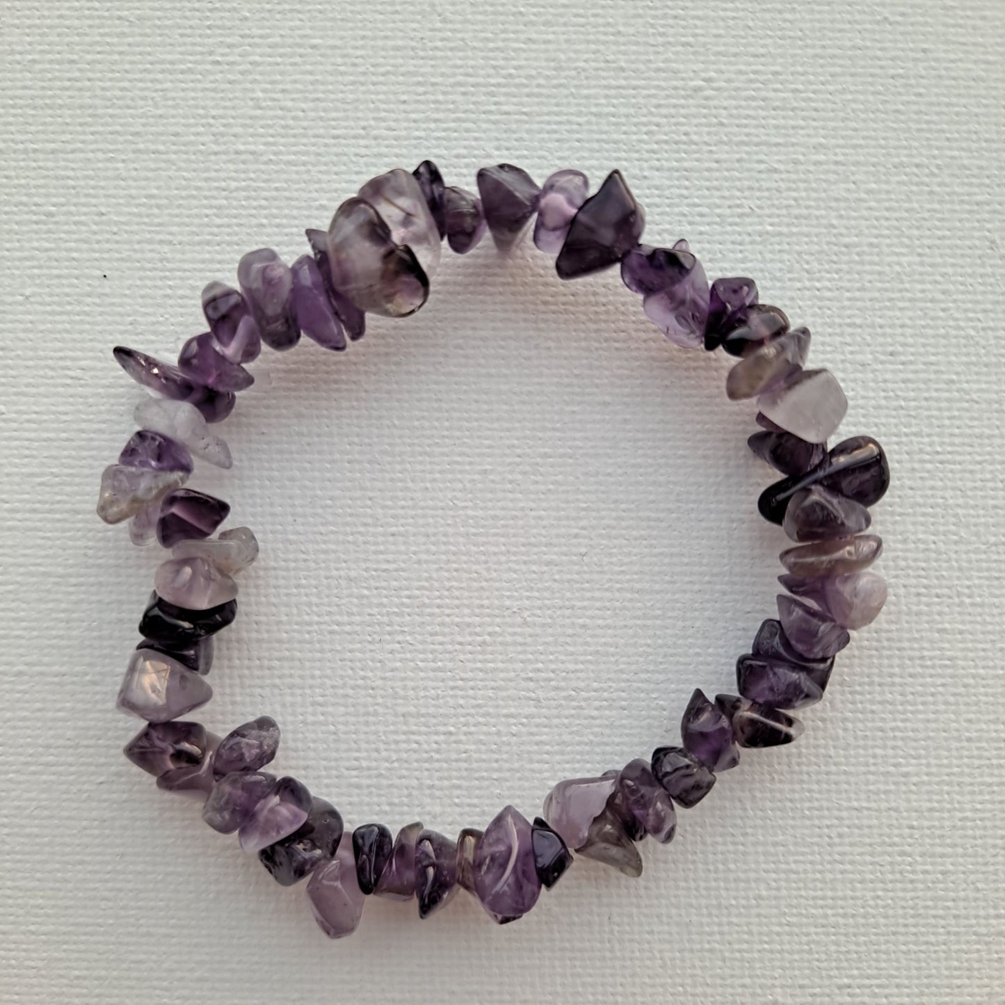 Dumi's Crystals Amethyst Chip Bracelet: Handcrafted with genuine Amethyst chips for inner peace, mental clarity, and a touch of bohemian style.
