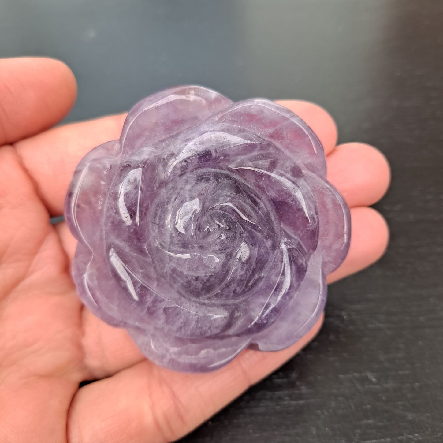 Dumi's Crystals | Amethyst Rose Carving (Hand-Crafted Beauty) | A captivating close-up of an Amethyst Rose Carving, showcasing its intricate details and mesmerizing purple hues. Each hand-crafted rose is unique, embodying the natural beauty of Amethyst. Embrace tranquility & spiritual awareness with this exquisite piece from Dumi's Crystals.
