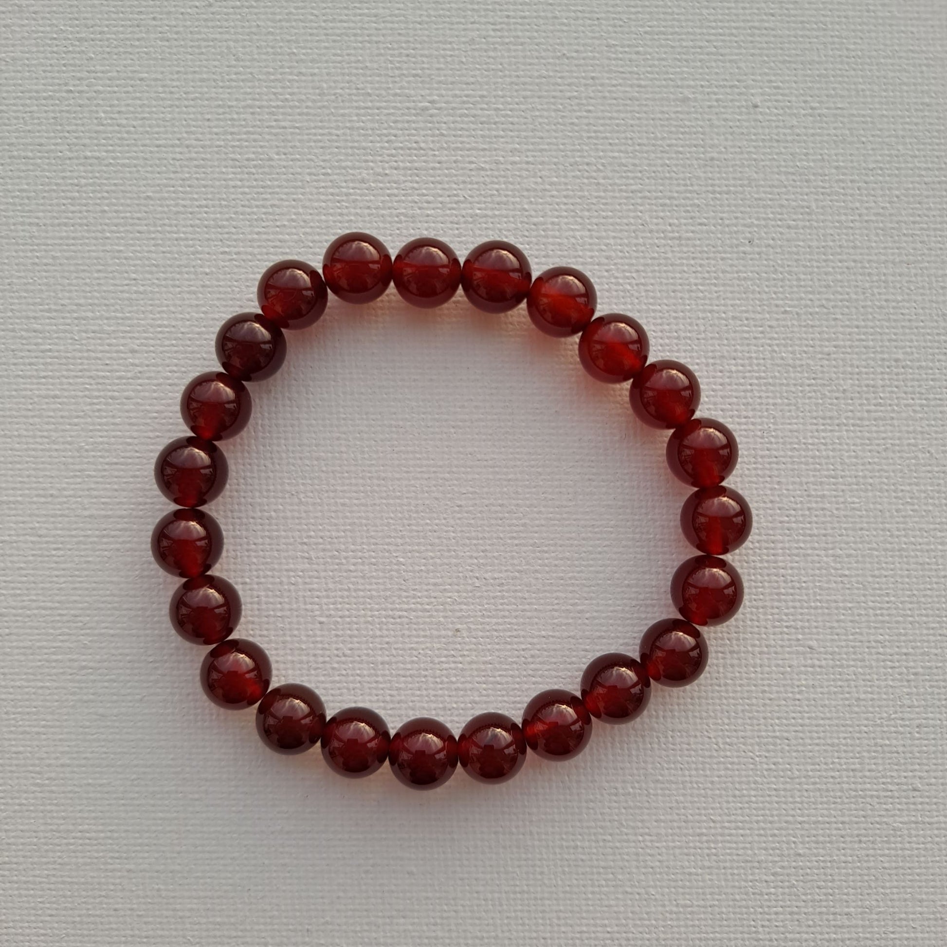 Dumi's Crystals Carnelian Bracelet (8mm). Unleash your inner fire with Carnelian. Promotes confidence, motivation & success. 