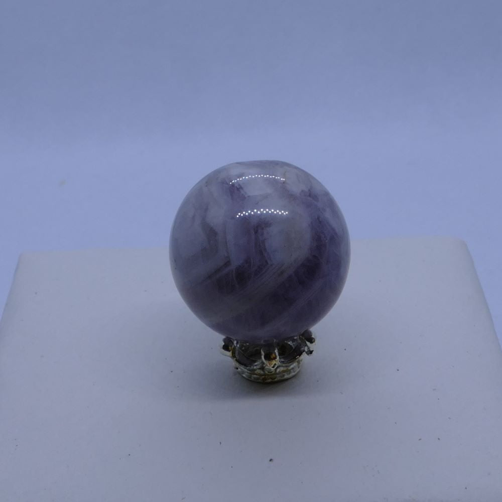 purple dream amethyst mini sphere on a crown stand and white background, seller is dumi's crystals