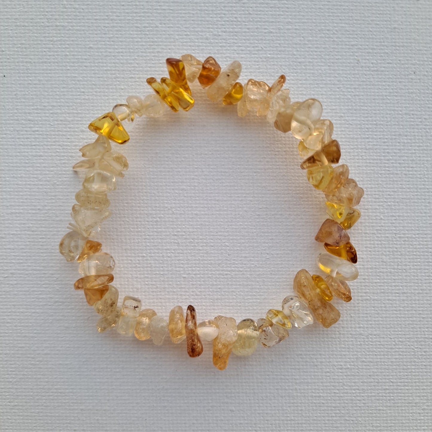 Dumi's Crystals Heat-Treated Citrine Bracelet. Embrace positivity! Vibrant Citrine chips promote joy, confidence & attract wealth.