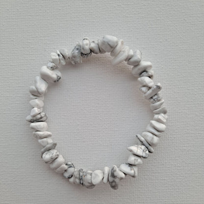 Dumi's Crystals | Howlite Chip Stretch Bracelet (7 Inch) | Close-up of a handcrafted bracelet featuring genuine Howlite chips. The calming white chips create a unique texture and cascade of color. Howlite, often called the "stone of calmness," is believed to promote stress relief, mental clarity, and emotional balance.