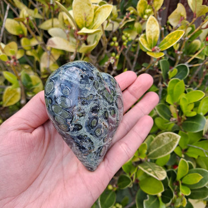 Dumi's Crystals | Unique Kambaba Jasper Heart Carving (Nature's Embrace): Immerse yourself in the grounding energy of a unique Kambaba Jasper Heart Carving. Hand-crafted to showcase natural beauty, this one-of-a-kind heart fosters emotional well-being, spiritual growth & a profound earth connection. Dumi's Crystals - Ethically sourced crystals for your journey.