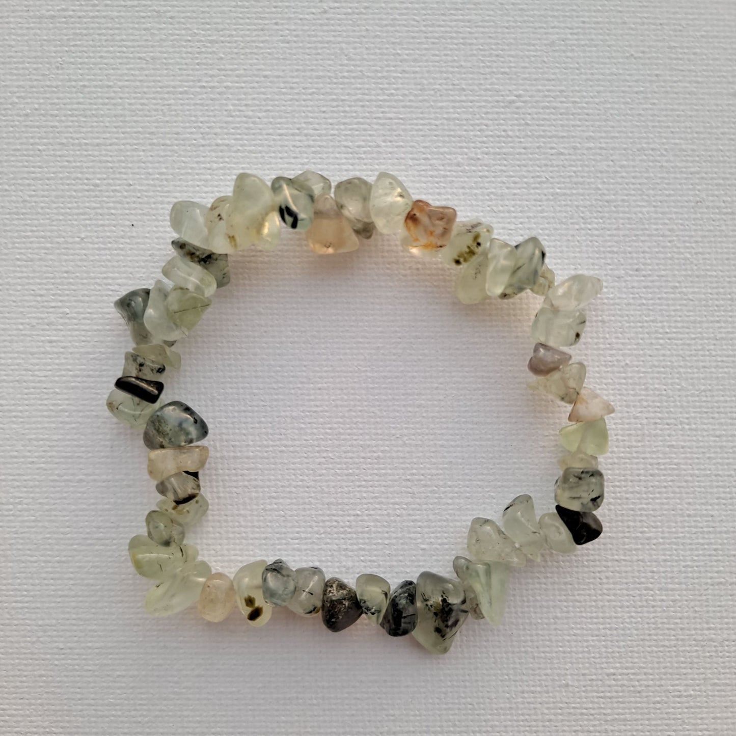 Dumi's Crystals Prehnite Bracelet. Embrace serenity! Prehnite chips for inner peace, emotional healing & spiritual growth.