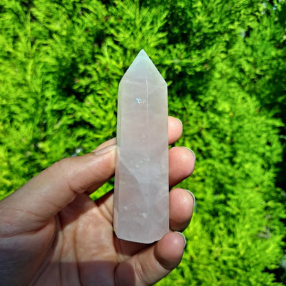 Embrace Your Loving Nature with Rose Quartz Tower | Dumi's Crystals | This Rose Quartz Tower (7-10cm) radiates gentle energy. Rose Quartz is thought to open your heart chakra, promoting self-love, emotional healing, and attracting positive relationships.