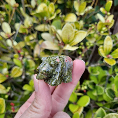 Dumi's Crystals | Unakite Bear Carving (Gentle Strength):  A close-up of a Unakite Crystal Bear Carving, showcasing its captivating green and pink hues. Hand-carved with love, this symbol of emotional balance & healing radiates gentle strength. Embrace peace with Dumi's Crystals (ethically sourced).